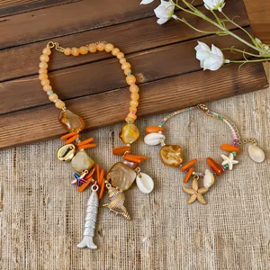 Detailansicht des Urlaubsstils Muschelperlen Halskette und Seestern Charm Armband Set