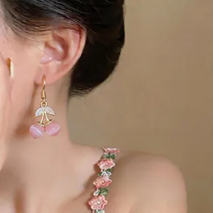 Elegant pink cherry cat-eye stone drop earrings with sparkling zircon leaf detail