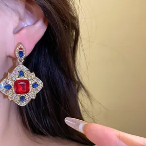 Vintage court style rhombus earrings with red and blue crystals and silver needles