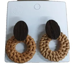 Handmade bohemian resort style rattan hoop earrings with dark wood oval studs for women