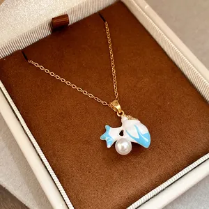 Detailed close-up view of vintage enamel starfish necklace with pearl and zircon inlay