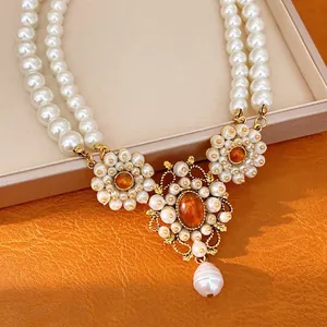 Vintage palace style resin double-strand pearl necklace with floral pendant and drop