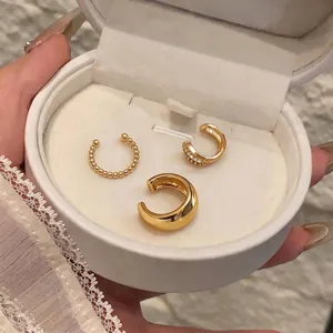 Elegant gold zircon ear cuff set for non-pierced ears in a white box