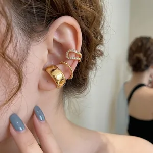 Stylish gold zircon ear cuff set for non-pierced ears shown on a female model