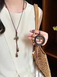 Vintage neo-Chinese style wood bead necklace with leaf charms on long brown cord