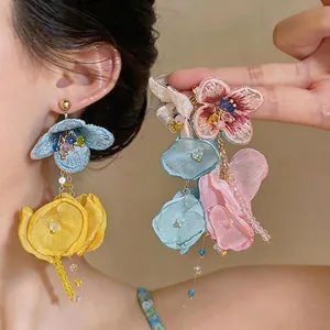 Elegant chiffon flower tassel earrings with embroidery for a dreamy resort look.