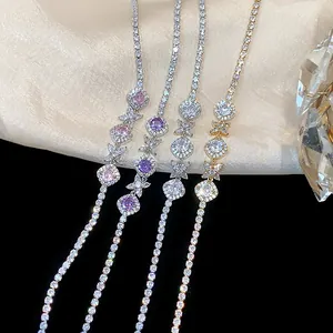 Detailed close-up view of elegant zircon bracelets with flower and diamond patterns.