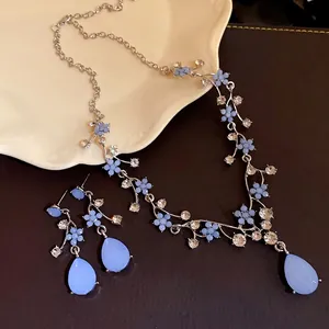Elegant light blue resin flower and waterdrop jewelry set with sparkling rhinestones