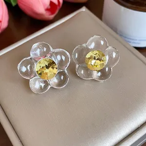 Elegant resin flower stud earrings with yellow faceted crystal center for a minimalist look