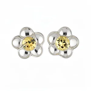 Elegant silver flower stud earrings with faceted yellow crystal center for women