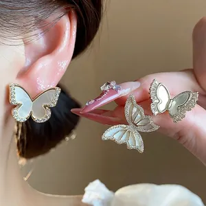 14k gold plated butterfly stud earrings with sparkling zircons and elegant white shell inlays