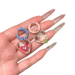 Vibrant dopamine style asymmetric heart hoop earrings in colorful transparent resin jewelry