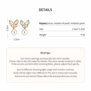 Detail view of 14k gold plated butterfly earrings with zircon and pearl specifications.