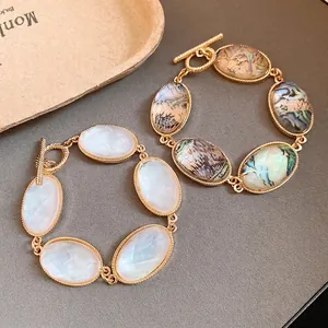 Vintage French style oval faceted resin bracelet with gold OT toggle chain clasp.