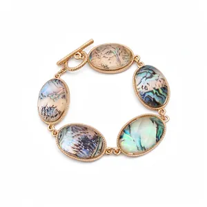 Elegant French vintage gold bracelet with faceted iridescent resin stones and OT toggle clasp