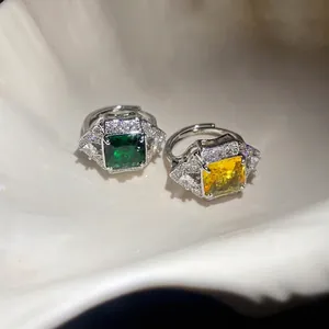 Exquisite square-cut zircon open rings in green and yellow colors with silver plating