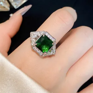Luxurious square green zircon halo ring featuring an adjustable open band design