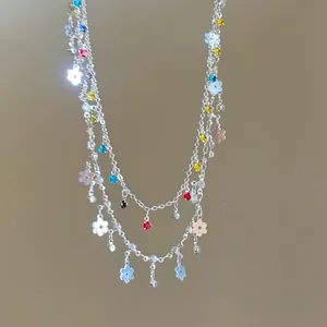 Dainty silver double-layer necklace with multi-colored crystals and flower charms
