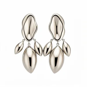 Irregular geometric polished silver-tone dangle earrings with high-shine distorted finish.