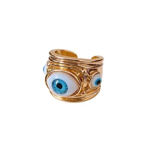 Exaggerated vintage gold evil eye adjustable open ring with blue resin eyes jewelry