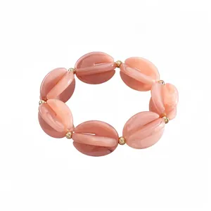 Eleganteres, marmoriertes rosa Acryl-Stretch-Armband mit goldenen Perlen im Retro-Chic
