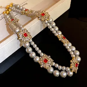 French vintage double-strand pearl necklace with red gemstone floral accents decoration