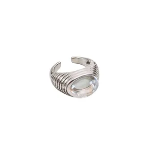 Retro silver-toned adjustable geometric ring with a clear oval resin center stone