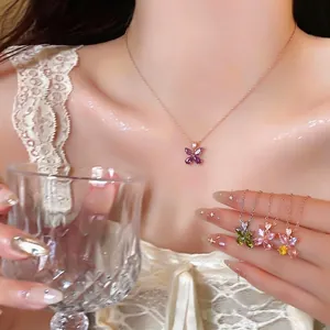 Elegant light luxury flower necklace with colorful zircons shown on an Asian model