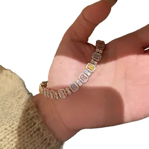 Elegant rose gold bracelet featuring colorful rectangular cubic zirconia stones