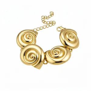 Elegant vintage gold metal shell bracelet featuring a sophisticated spiral design for women