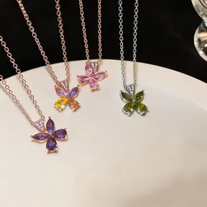Detail shot of elegant flower necklaces featuring colorful water-drop zircon stones