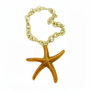 Beach vacation style acrylic starfish pendant necklace with chunky gold chain jewelry