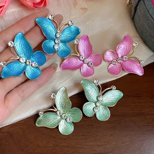 Elegant butterfly stud earrings with zircon inlay and colorful enamel finish