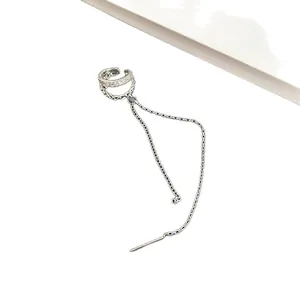 Elegant silver-tone ear cuff featuring shimmering zircon and a long dainty chain tassel.