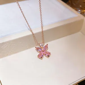 Elegant rose gold necklace featuring a dainty pink teardrop zircon flower pendant