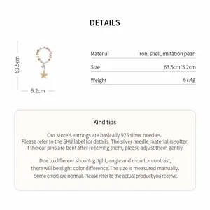 Detailed view of vacation-style shell and pearl beaded necklace with starfish pendant