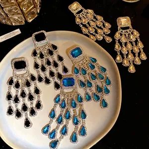 Luxury silver needle earrings with square gemstones and cascading teardrop tassels