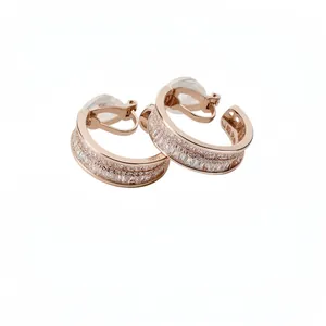 Elegant rose gold plated wrinkled hoop clip-on earrings with baguette crystals