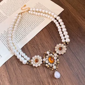 Vintage double layer pearl necklace with floral resin pendants and baroque pearl drop