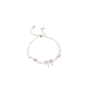 Elegant silver adjustable bracelet featuring sparkling pink zircon bowknot and heart charms