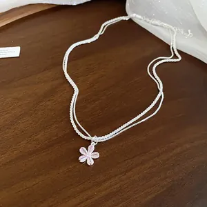 Sparkling silver double-layer necklace with a pink zircon flower pendant for women