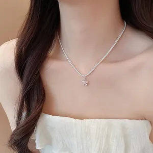 Sparkling silver flower necklace with zircon pendant on elegant model