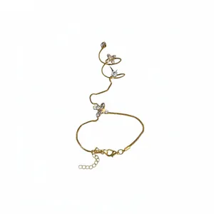 Elegant gold plated finger bracelet with sparkling zircon flower design for women
