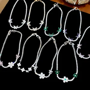 Detailed view of elegant zircon butterfly and flower tennis bracelets