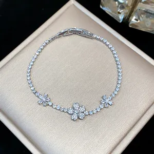 Exquisite detail of a silver zircon butterfly bracelet with sparkling stones and folding clasp.