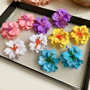 Vibrant 3D acrylic flower stud earrings in multiple colors for a fresh summer look.