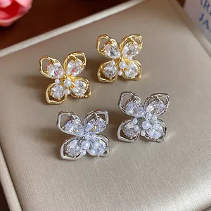 Elegant gold and silver plated flower stud earrings with sparkling zircons and pearls