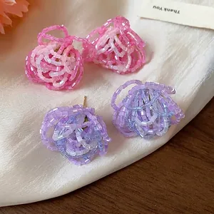 Elegant handmade glass bead flower stud earrings in pink and purple gradient colors