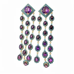 Vintage style gold-plated tassel earrings with purple stones and turquoise borders