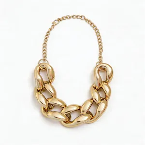 Statement chunky gold polished chain necklace with punk hip hop style on white background